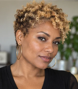 Natural coily blonde pixie on an adult woman — original AI-generated hair color inspiration
